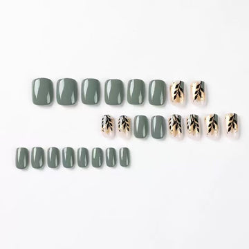 Light green square press-on nails with gold foil accents