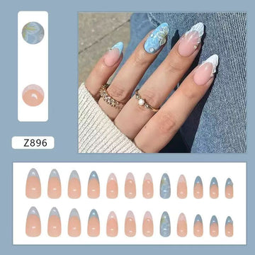 Blue-and-white marble nails with glitter