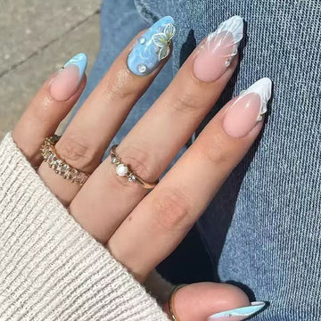 Blue-and-white marble nails with glitter