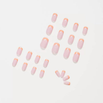 Peach nude nails with gradient tip