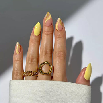 Yellow gradient nails with bold style