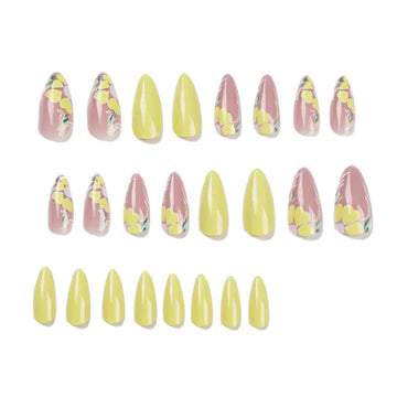 Yellow-and-nude nails with floral decor