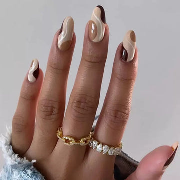 Nude nails with subtle glitter details