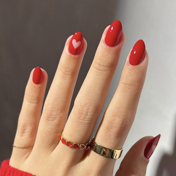 Red nails with glossy finish