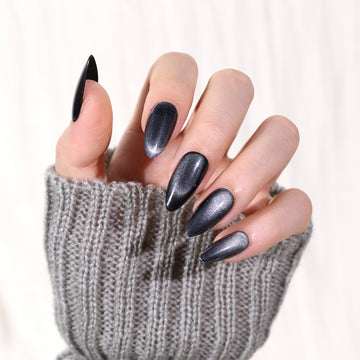 Sleek Black Glitter Almond Nails